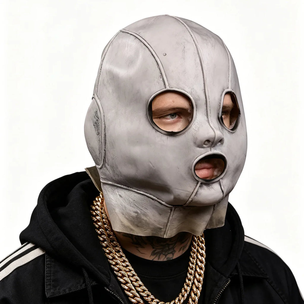 Three-quarter worn view shows the silver mask eye and mouth openings.