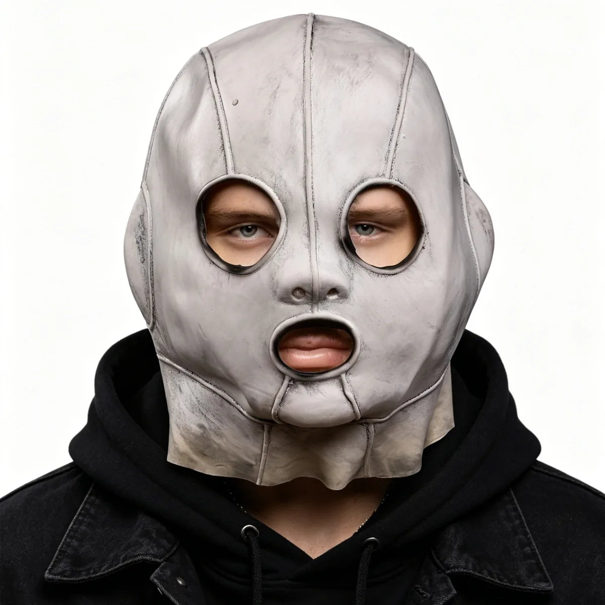 Adult wears the silver stitched full-head mask from the front.