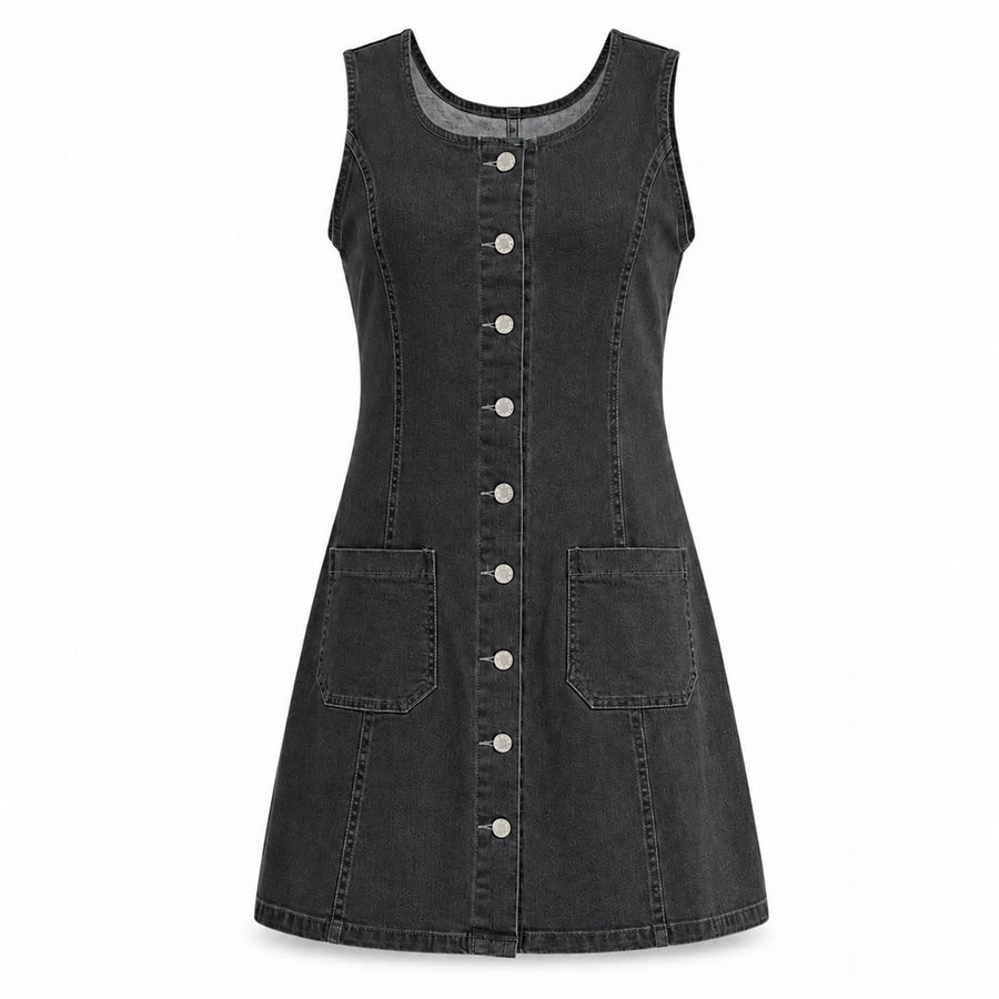 The black-gray denim dress is displayed alone, revealing its scoop neckline, front seams and flared hem.