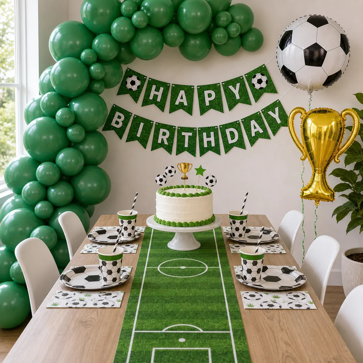 Complete soccer party supplies set with solid green balloon garland soccer table runner themed tableware and foil balloons
