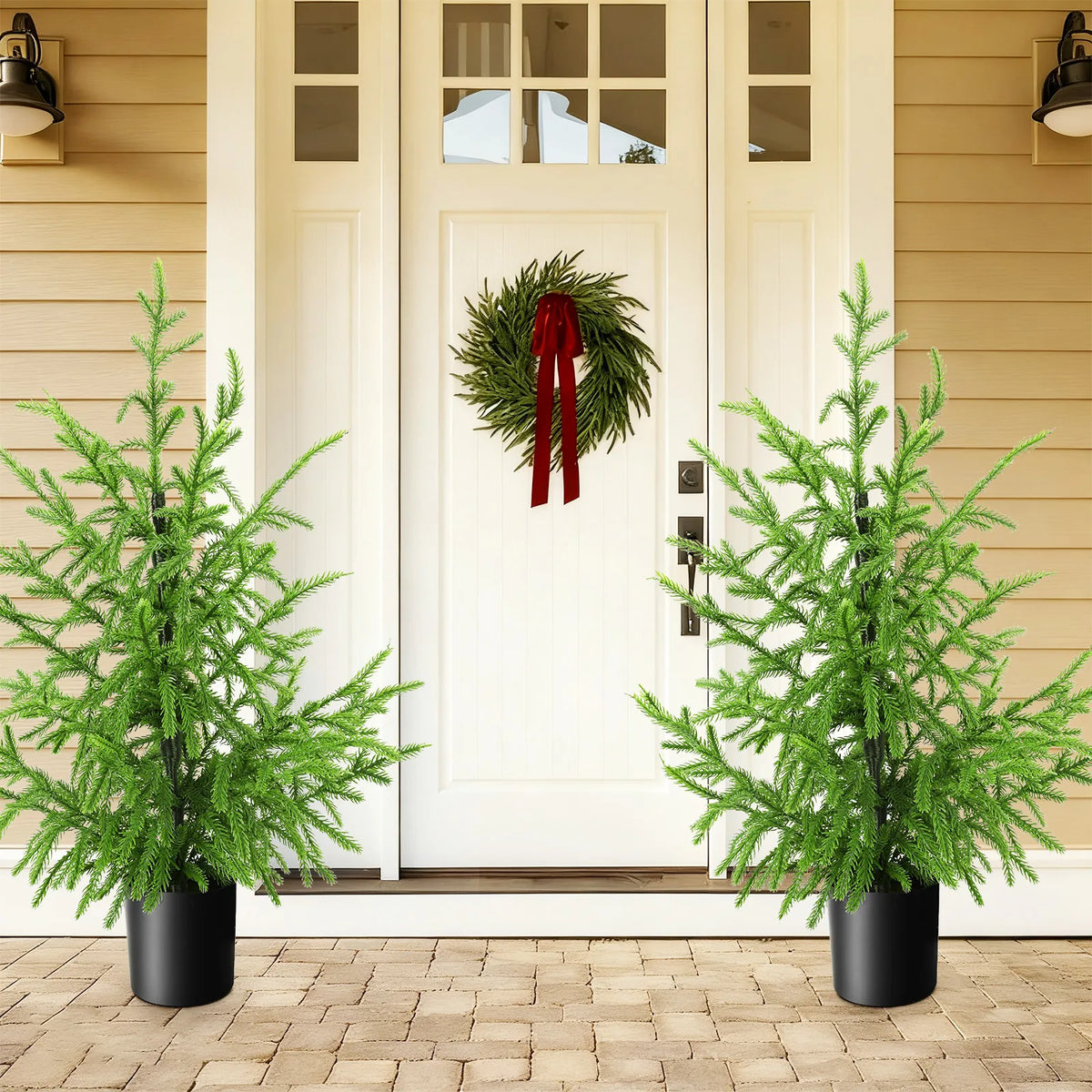 Two 60 cm potted trees frame a doorway in a display scene.