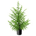 The 60 cm artificial green tree stands in a black pot.