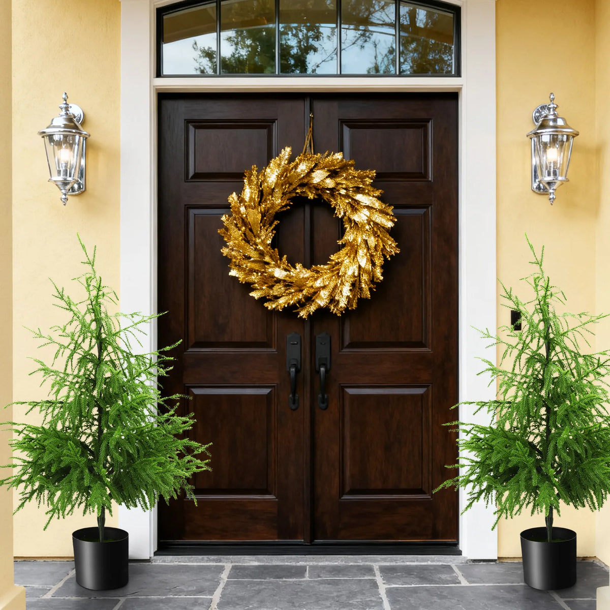 Two 90 cm potted trees frame a doorway in a display scene.