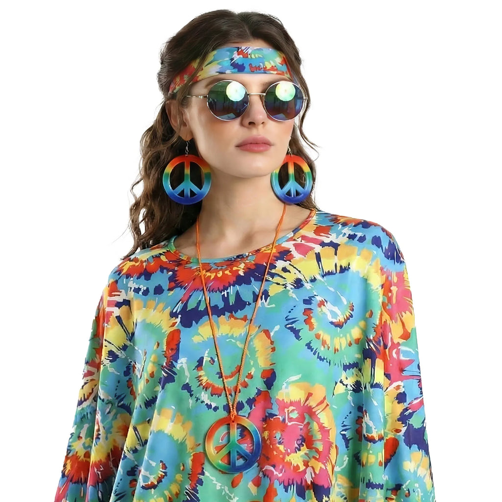 A close worn view highlights the matching printed headband, round glasses, peace-sign earrings, pendant and multicolor poncho pattern.