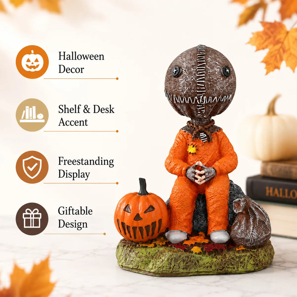 Trick-or-treat child figurine displayed with pumpkins in a warm autumn shelf setting.