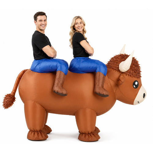 Front view shows both wearers inside the two-person Highland cow costume behind the horned head.