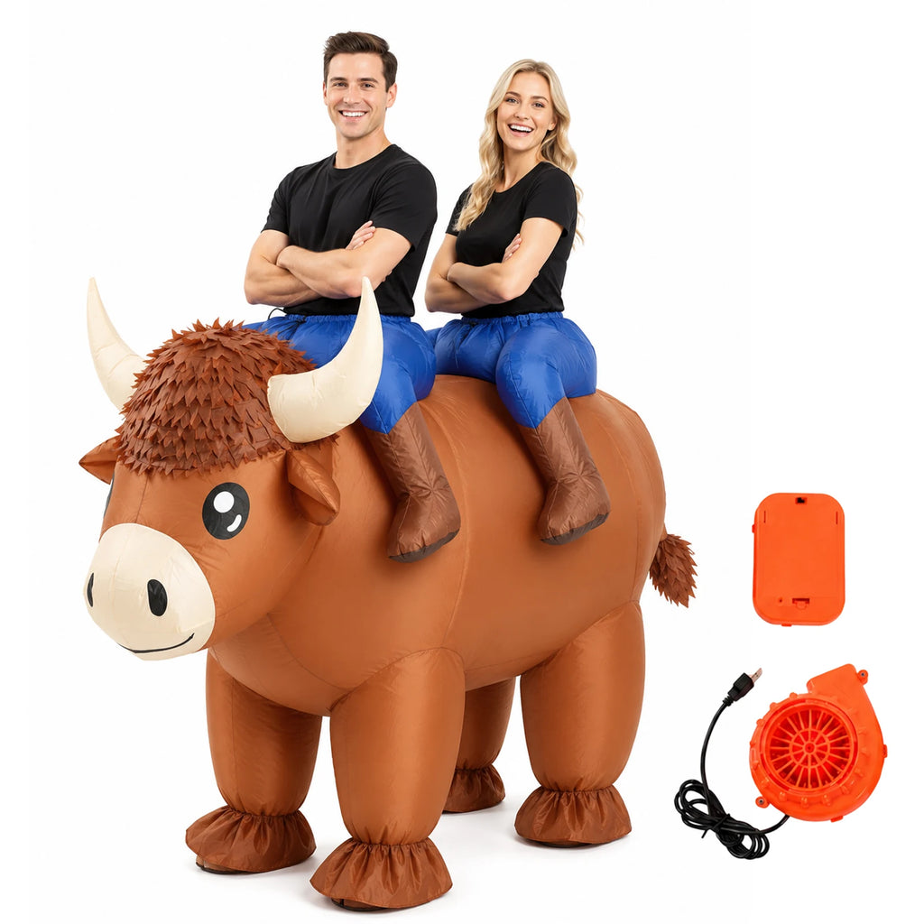 Two adults wear the long inflatable Highland cow costume with horned head and printed shaggy body.