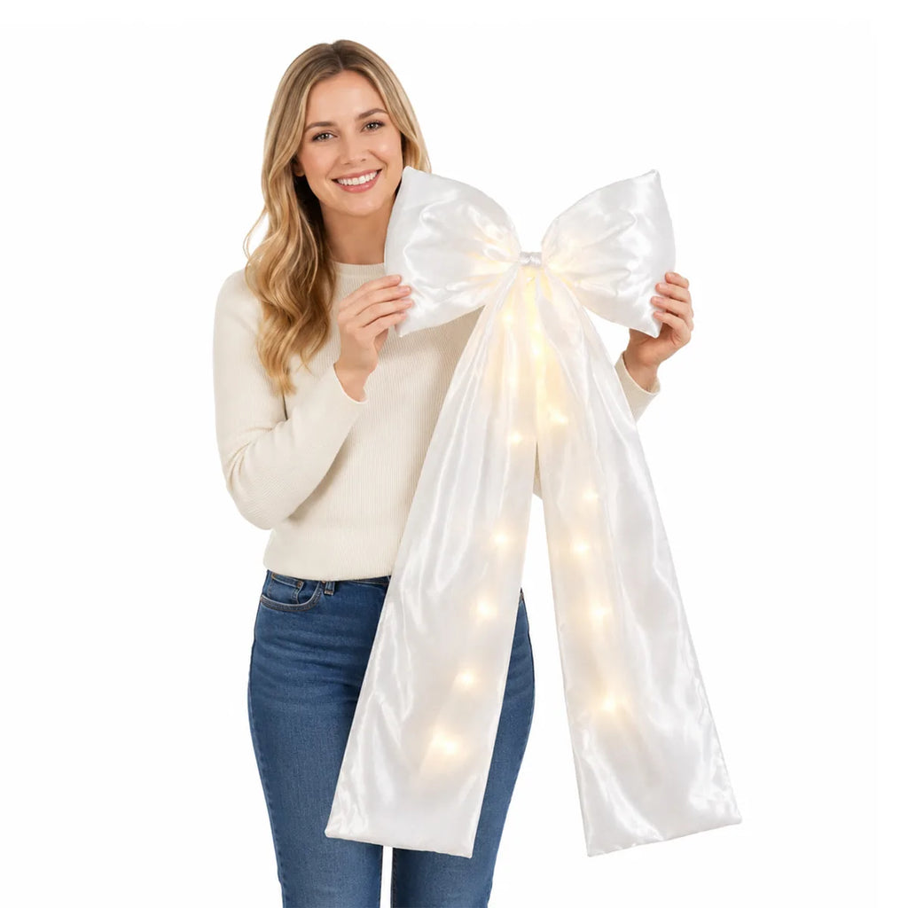 Styled view of the white led bow decoration, showing how the item appears in use.