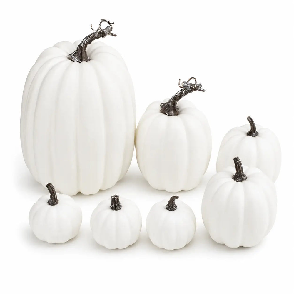 Set of 7 white decorative pumpkins of varying sizes, arranged on a white background