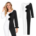 A woman models the Art the Clown-inspired split black-and-white jumpsuit beside a full product view.