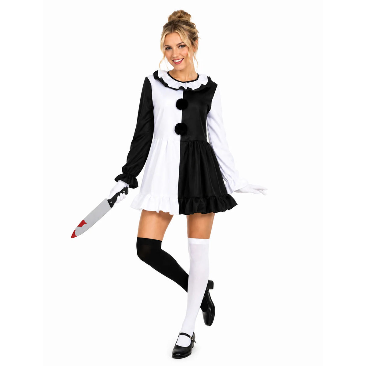 Woman wearing the complete black and white mime clown dress with mismatched socks and prop knife.
