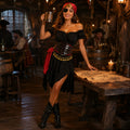 Woman wearing the black and red pirate costume in a tavern setting