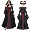 Black and red women's vampire costume dress displayed with the included jeweled choker.